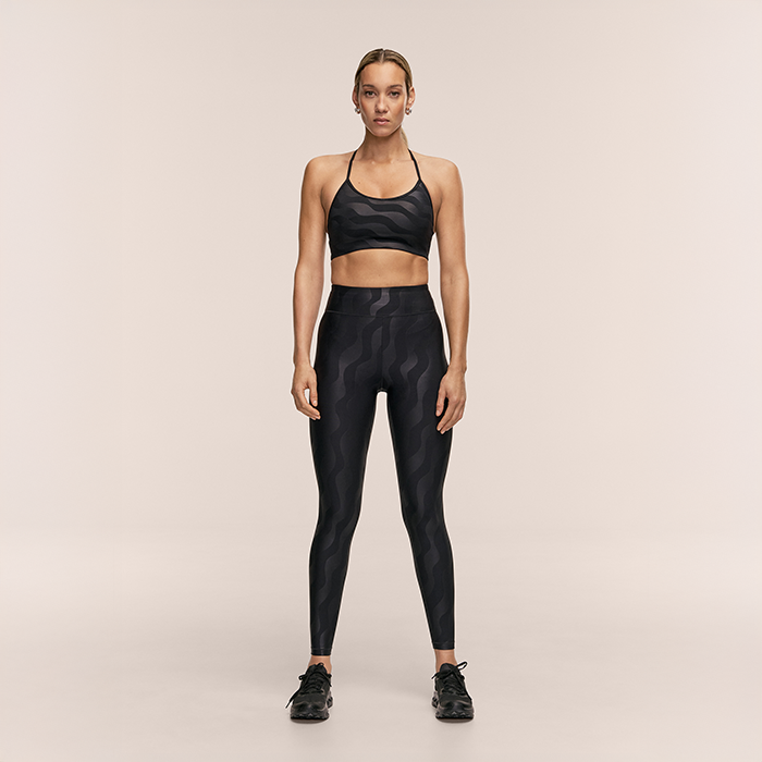 Sleek Sport‑BH Svart M&ouml;nstrad